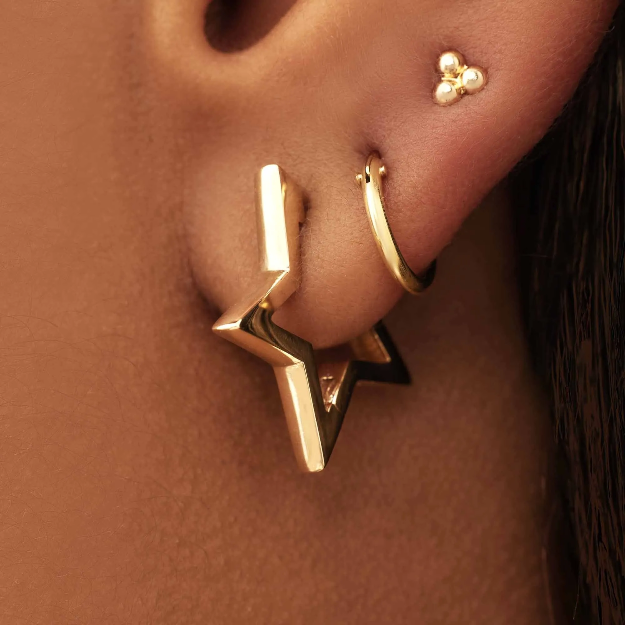 Monceau Juene 14 karat gold star earrings
